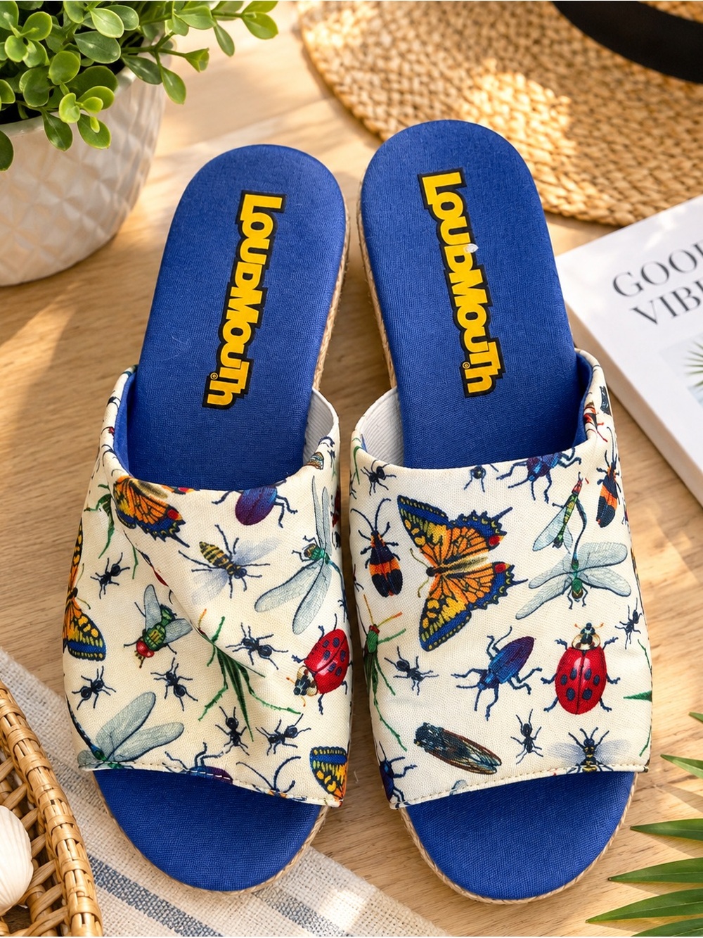 Loudmouth Cream Canvas Slide Mules with Blue Footbed and Bug Print